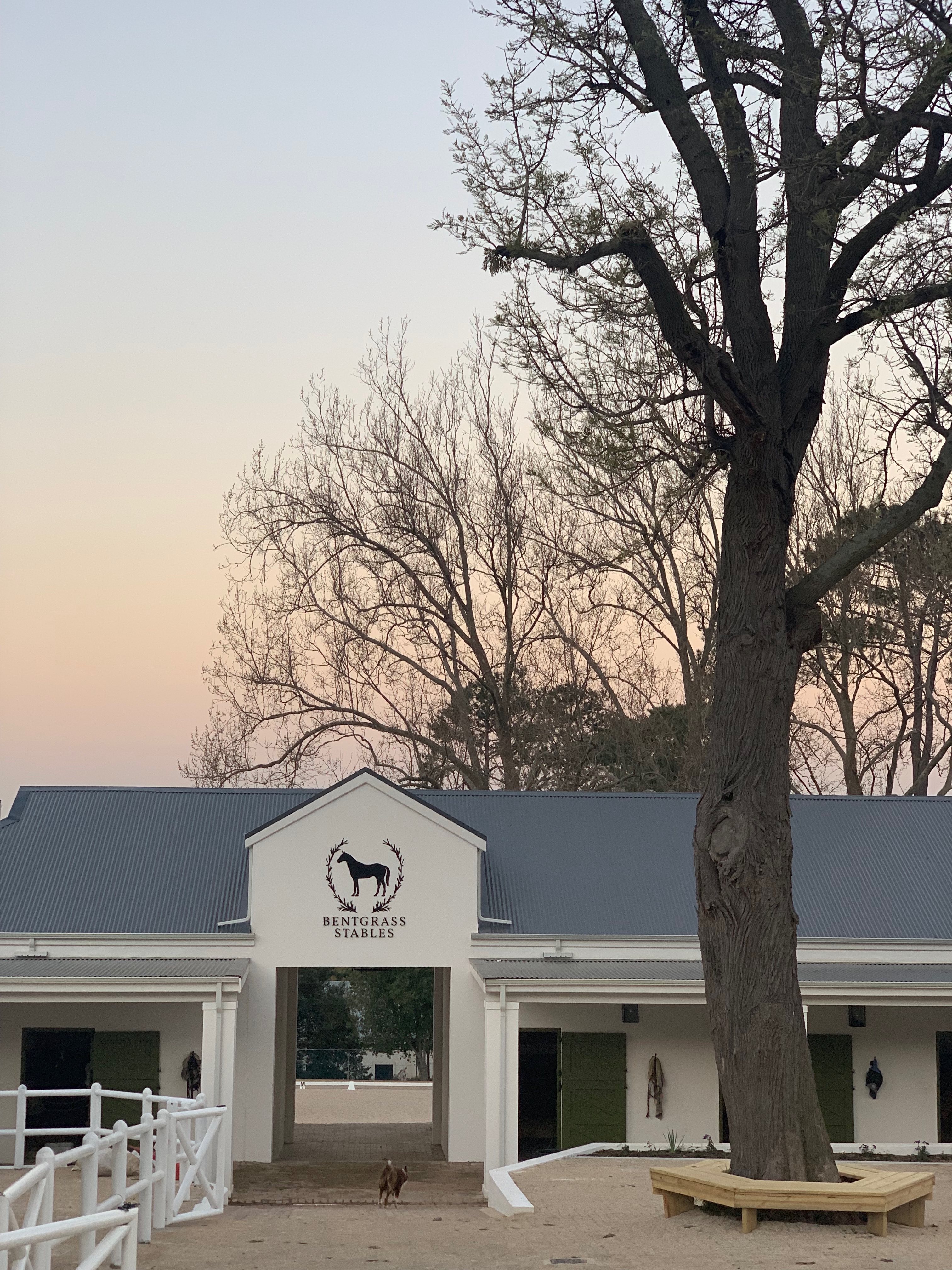 Bentgrass Stables main building with spacious courtyard for horsebox parking